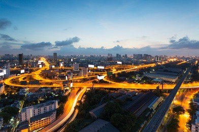 bangkok expressway , freeway and motorway , an important infrastructures in bangkok at night , thailand 