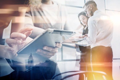 business team work process.double exposure photo professional crew working with new startup project.investment managers meeting. analyze business plans laptop.blurred,film and bokeh effect. horizontal