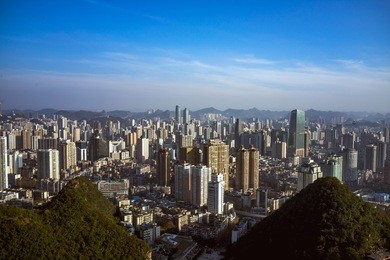 china urban cityscape. skyscrapers and slums. guiyang, guizhou province.