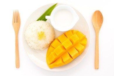 thai sweet sticky rice with mango. thai style tropical dessert, glutinous rice eat with mango