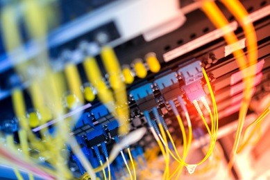 fiber optic with servers in a technology data center .