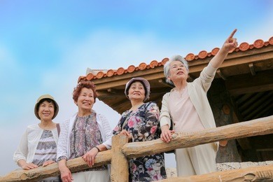 elderly people are looking at the landscape
