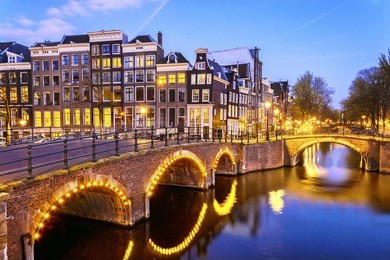 canal in amsterdam at night, netherlands