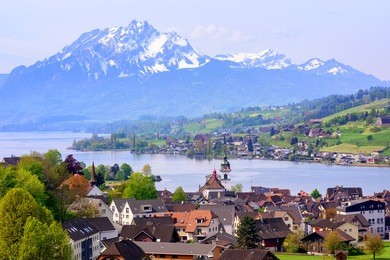 kussnacht am rigi old town with pilatus mountain and lake lucerne in background, switzerland