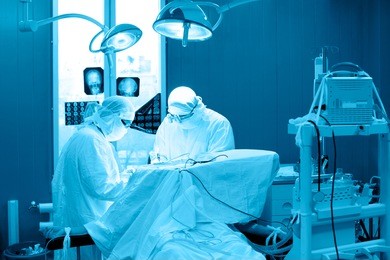 real brain surgery, two surgeons at work, blue toning