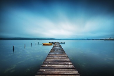 small dock and boat at the lake