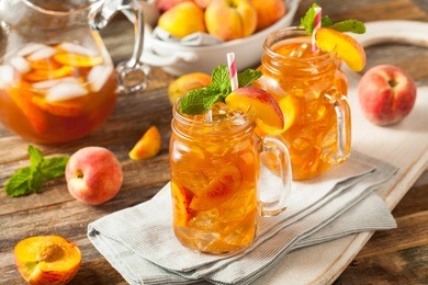 fresh homemade peach sweet tea with mint