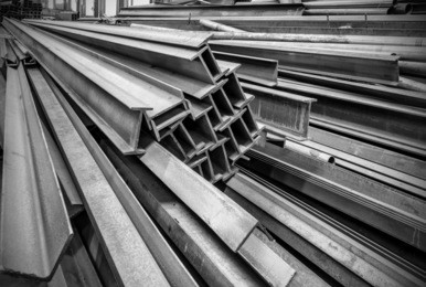 steel factory floor, stacked with a lot of steel