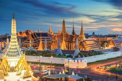 grand palace and wat phra keaw at sunset bangkok, thailand. beautiful landmark of asia.  temple of the emerald buddha. landscape of the capital city 