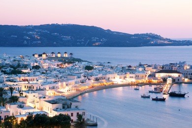 beautiful sunset at mykonos island, greece