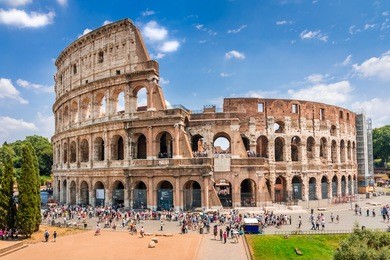 colosseum with clear blue sky and clouds, rome,italy. rome architecture and landmark. rome colosseum is one of the best known monuments of rome and italy