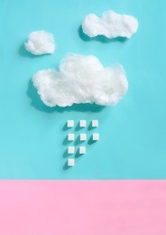 sugar concept, clouds made of cotton candy with sugar rain falling