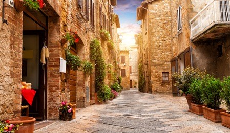 colorful street in pienza, tuscany, italy