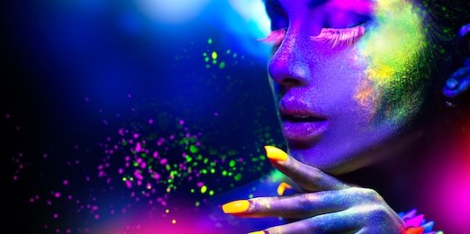 fashion model woman in neon light, portrait of beautiful model with fluorescent make-up, art design of female disco dancers posing in uv, colorful make up. isolated on black background