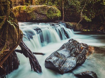 vintage retro effect filtered hipster style image of tropical waterfall phnom kulen, cambodia