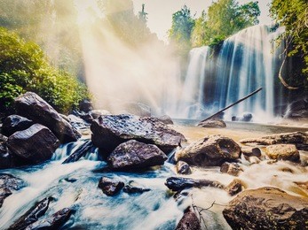vintage retro effect filtered hipster style image of tropical waterfall phnom kulen, cambodia