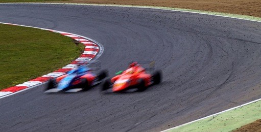 racing cars in motion