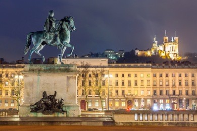 lyon place bellecour statue of king louis xiv at night france