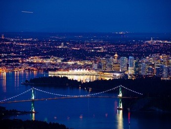 night city and ocean view. 
metro vancouver, port of vancouver and lions gate bridge. view from cypress mountain. british columbia, canada. 