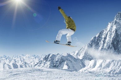 snowboarder in high mountains