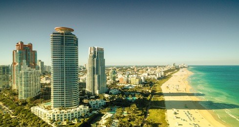 awesome aerial view of miami skyline from helicopter.