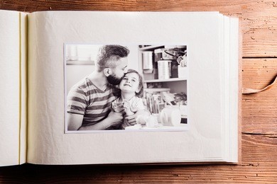 fathers day composition. photo album, black-and-white picture.