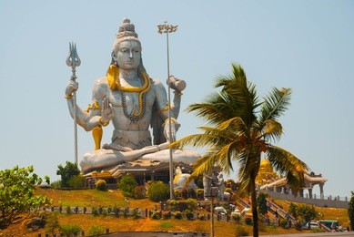 statue of lord shiva was built at murudeshwar temple on the top of hillock which overlooks the arabian sea and it is 37 meters in height. murudeshwar. karnataka, india