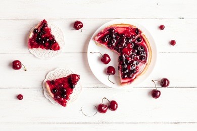 dessert with red berries on wooden white background. summer fruit dessert. top view, flat lay