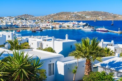 a view of mykonos port and town, island of mykonos, cyclades, greece