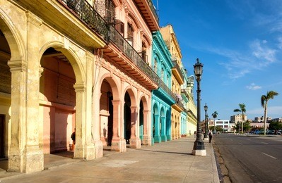 street scene with colorful buildings in downtown havana right in front of the capitol