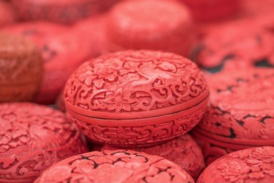 engraved egg-shaped red boxes, panjiayuan flea market, beijing, china