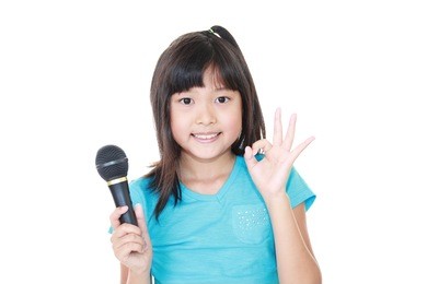 asian girl holding microphone 