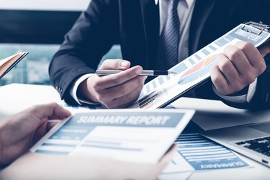 group of business people busy discussing financial matter during meeting
