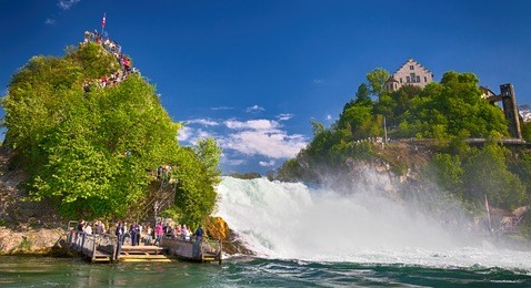 view to rhine falls (rheinfalls), the largest plain waterfall in europe. it is located near schaffhausen, between the cantons of schaffhausen and zurich