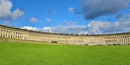 view of the landmark royal crescent seen from victoria park in bath in somerset england
