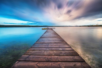 small dock and boat at the lake