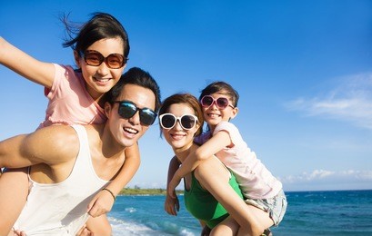 happy family having fun at the beach