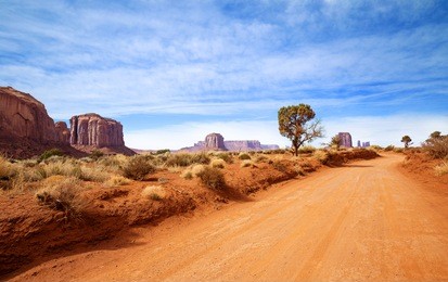 red dirt road in rocky desert scenery