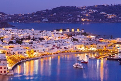 mykonos port with boats at evening, cyclades islands, greeces
