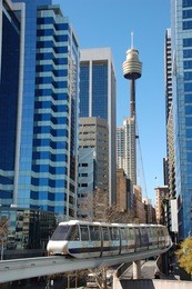 sydney mono rail downtown with sydney tower and skyscrapers in the background