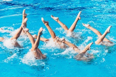 synchronized swimmers performance with legs outside water