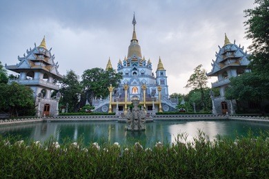 buu long pagoda at district 9, ho chi minh city, vietnam in a rainy day with a beautiful dusk moment.