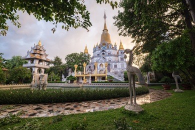 buu long pagoda at district 9, ho chi minh city, vietnam in a rainy day with a beautiful dusk moment.