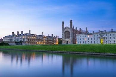 evening panorama of cambridge university and kings college chapel, uk