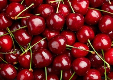 cherry background.  sweet organic cherries on market counter
