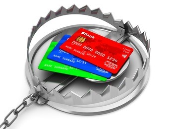 3d illustration of credit cards inside bear trap, financial risk concept
