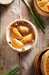 various dim sum in bamboo steamed bowl