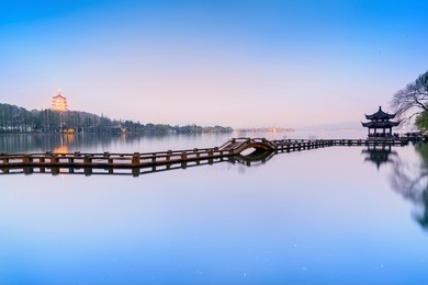 landscape of west lake. long bridge and leifeng pagoda. located in hangzhou city, jiangsu province, china.