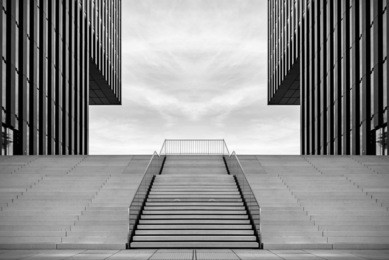 wide stairway between two modern office buildings at the medienhafen (media harbour) in dusseldorf, germany. toned.