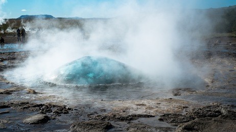 bursting bubble. geysir / gush spring in iceland. milliseconds before eruption